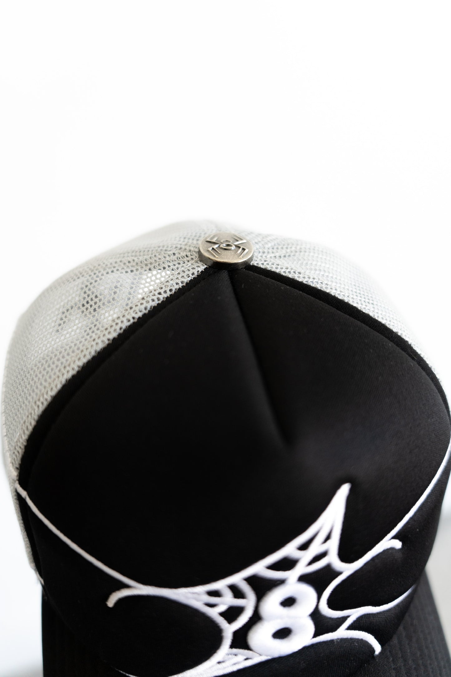 Eight's Web Trucker Hat